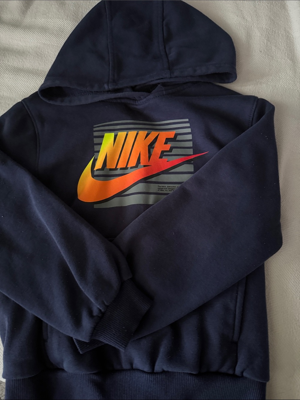 Nike Navy Hoodie with Orange-to-Yellow Gradient Logo